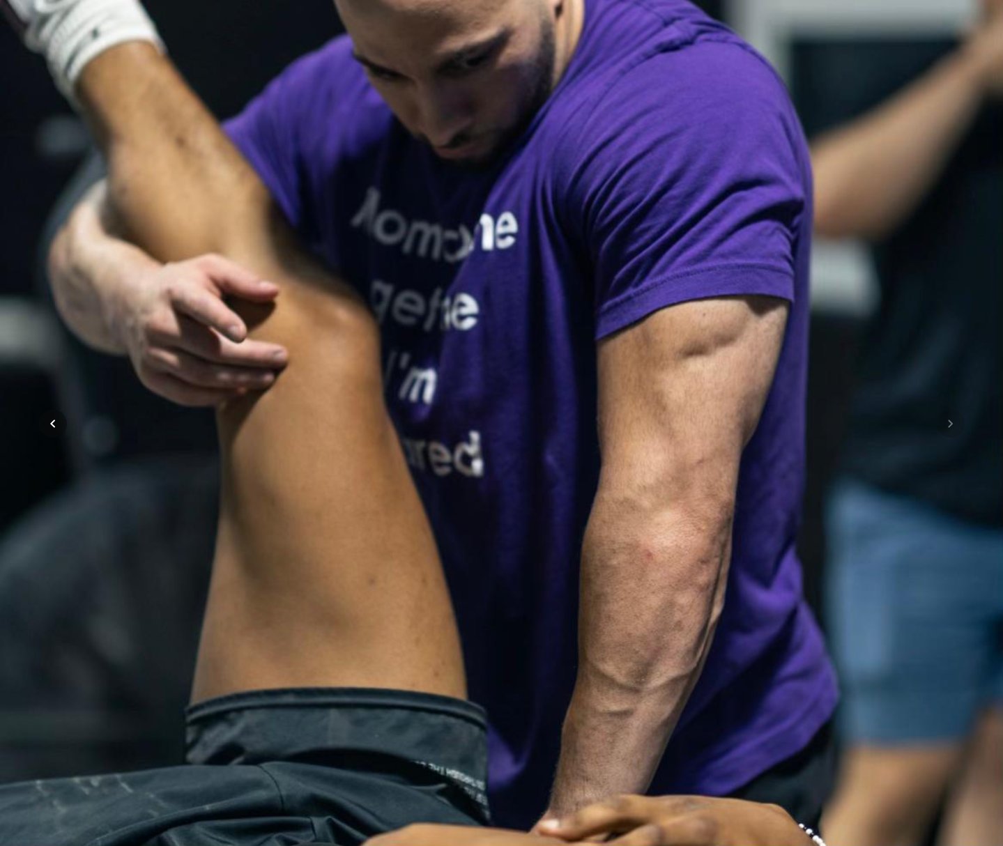 Max performing deep tissue bodywork on a client